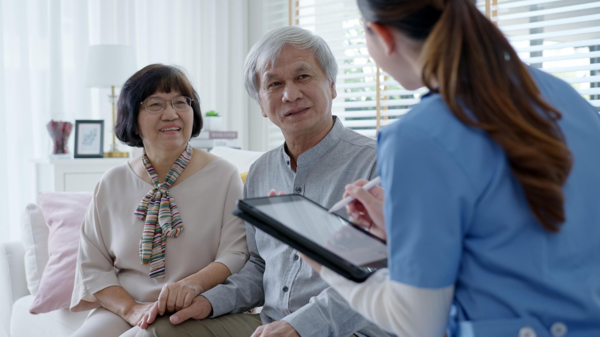 Nurse talking to patients